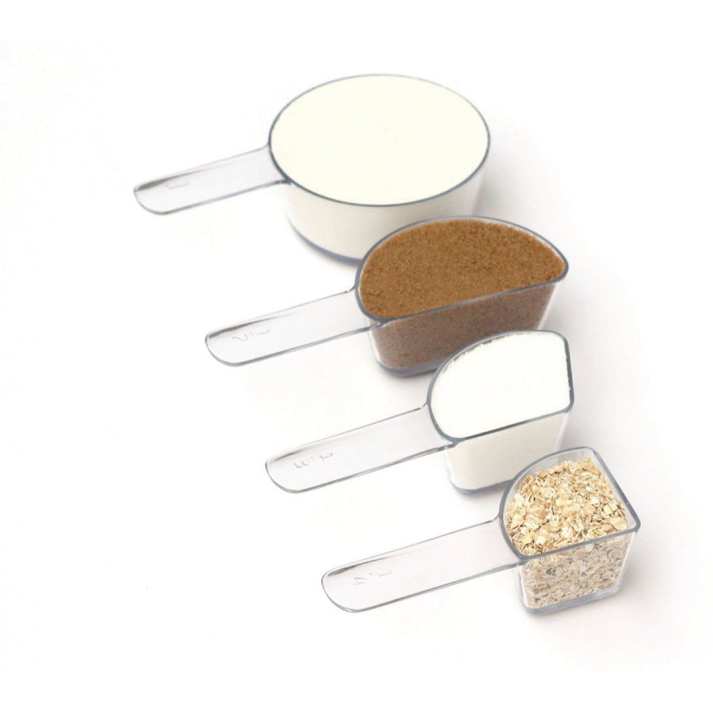 Photo of visual measuring cups arranged in a line and filled with ingredients ranging from flour to brown sugar to oatmeal